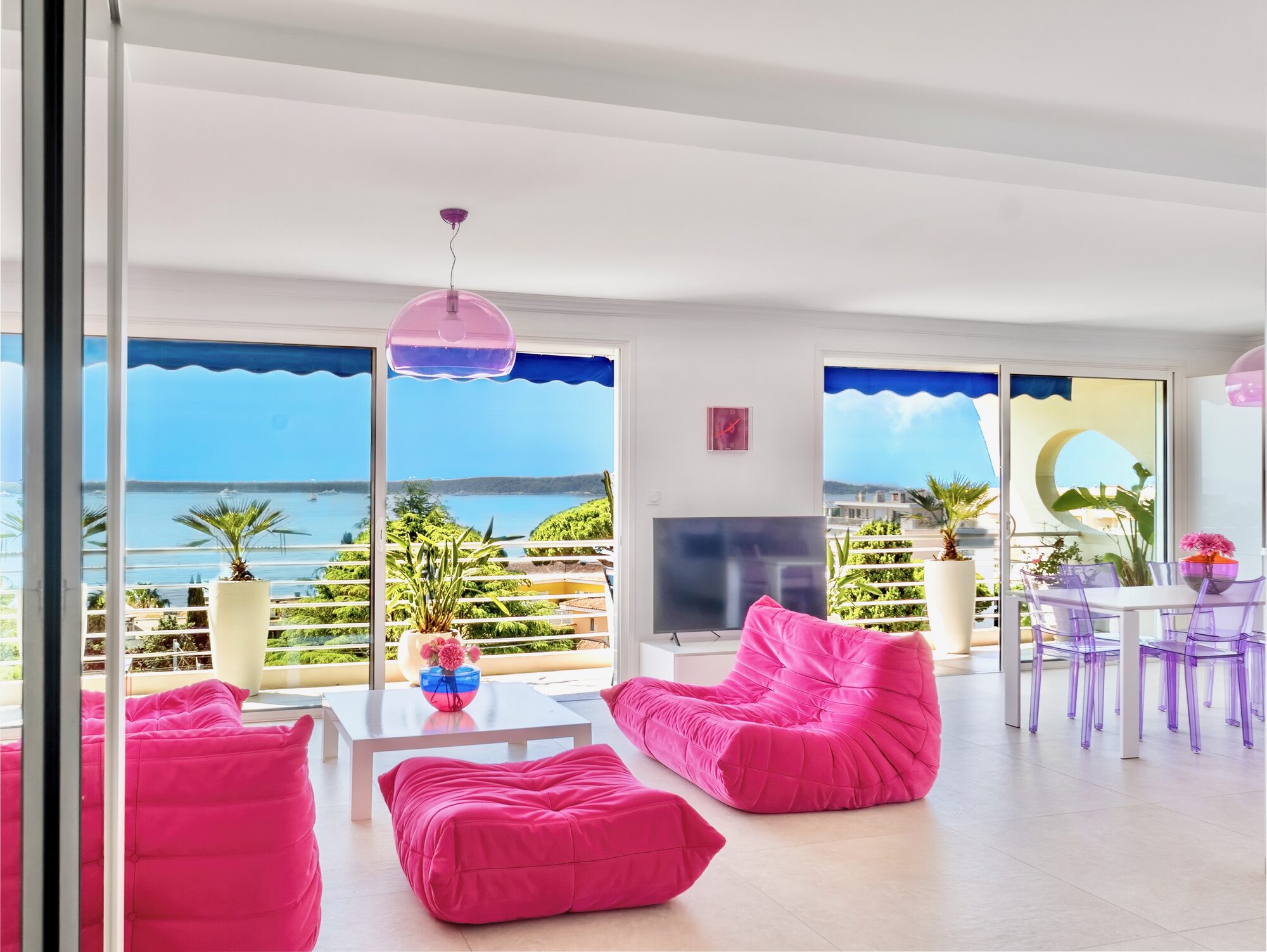 Salón con sofás Togo rosas, Royal Pink